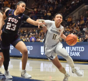 J.J. Quinerly injures knee, as No. 24 WVU closes out regular season with win against TCU